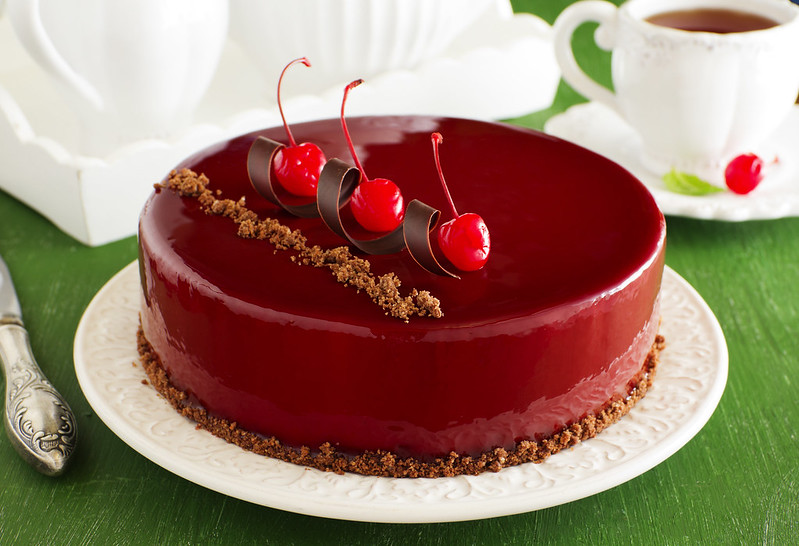Chocolate cherry cake covered with a mirror coating.